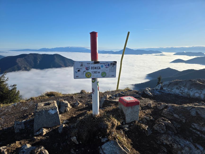 Triglav summit Slovenia panoramic view clouds alpine ridge