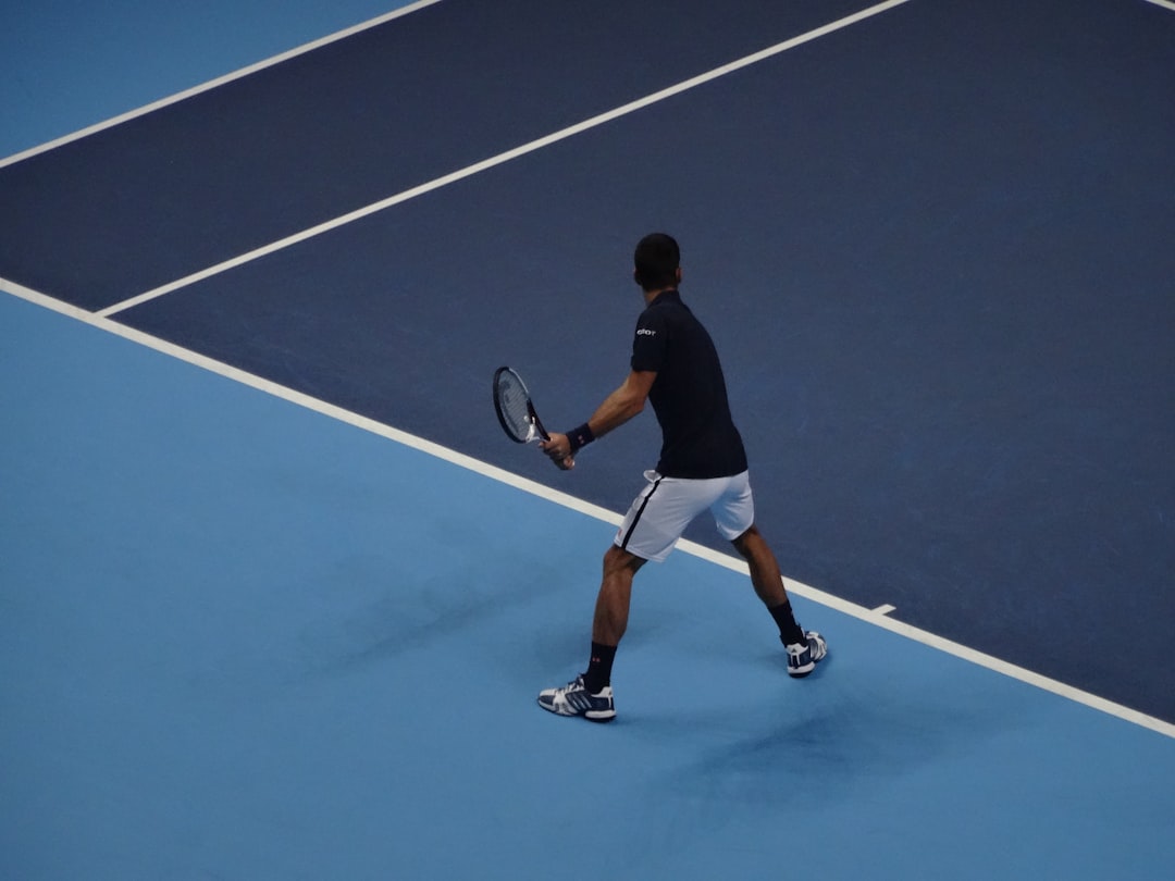 Miomir Kecmanovic tennis match intense focus