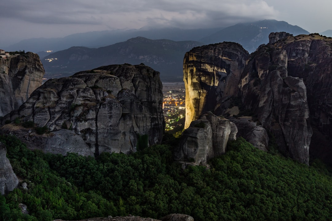 interior dark cave stone walls Meteora Greece candlelight