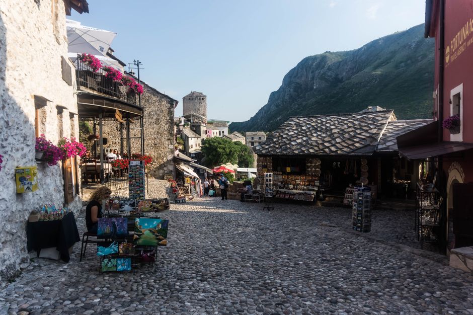 Kujundžiluk street Mostar narrow cobblestone shops leather goods