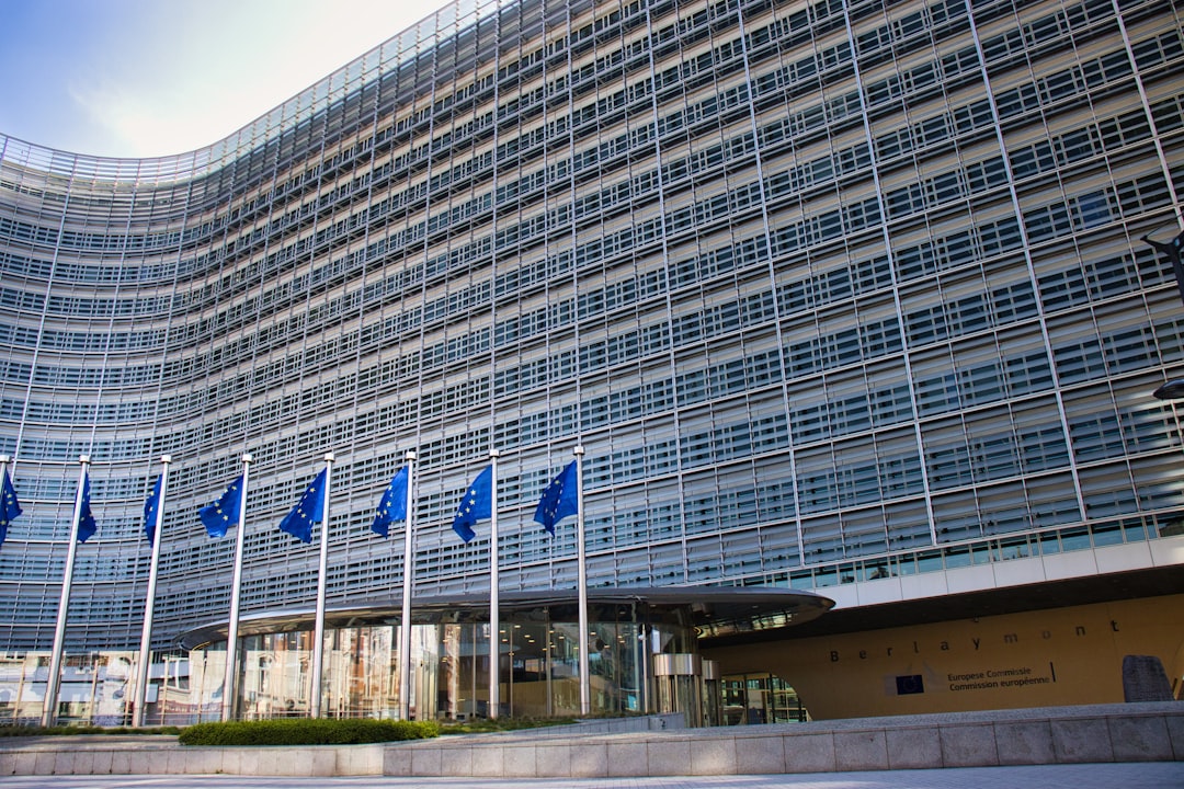 European Union flag waving outside Brussels headquarters