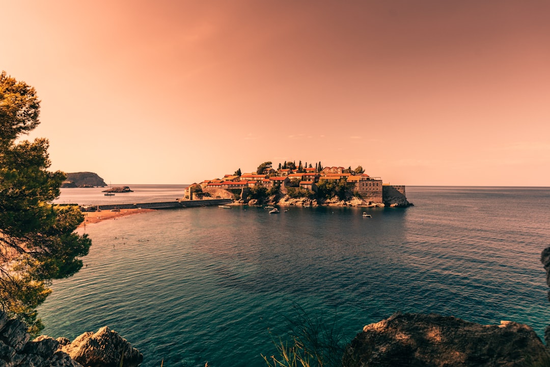 Sveti Stefan Montenegro island luxury hotel sandbar turquoise water