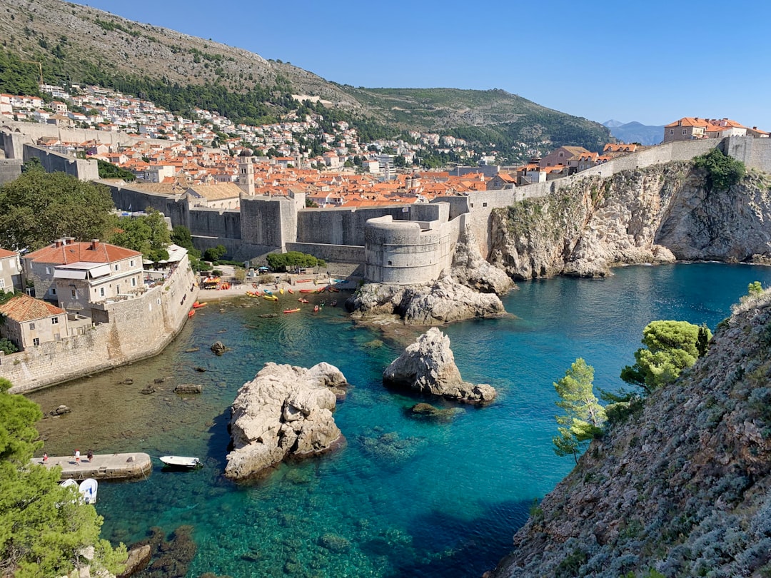 Dubrovnik City Walls Croatia stone battlement view terracotta roofs