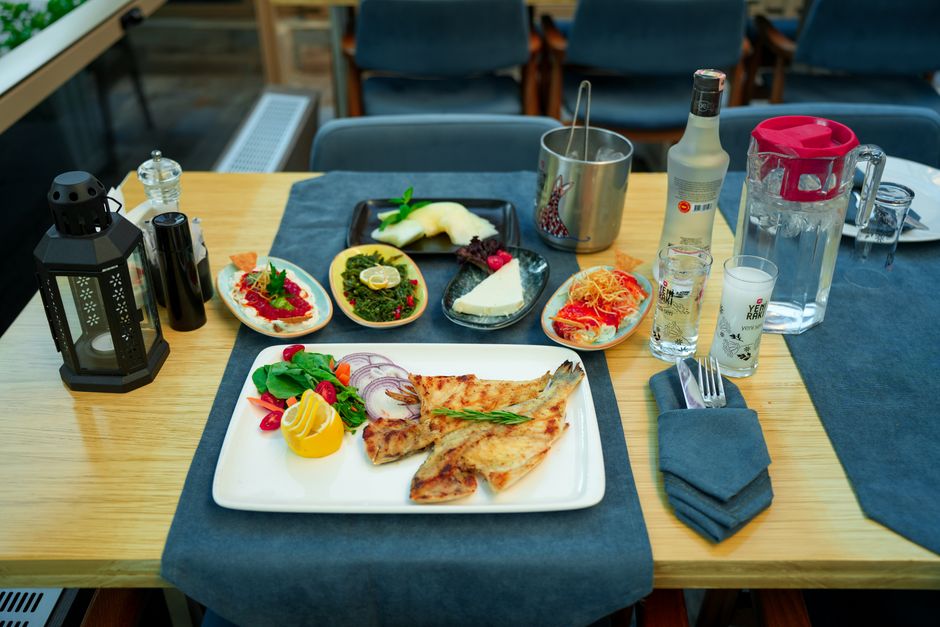 Split seafood restaurant table grilled fish seafood platter