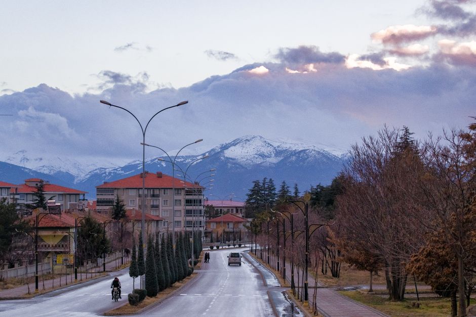 Rila town evening street lights quiet atmosphere mountain backdrop