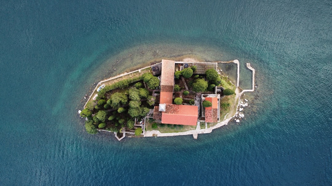Our Lady of the Rocks Montenegro island aerial view blue water