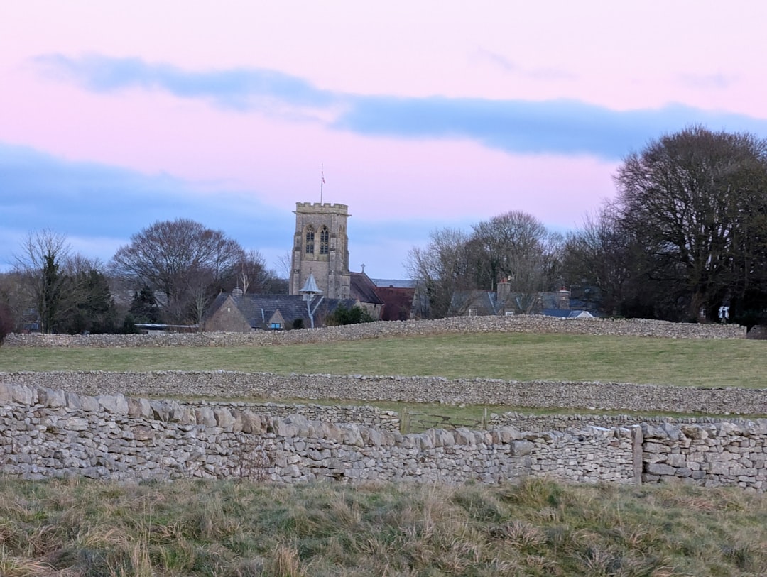 Abbey of St. John Tkon church bell tower stone architecture rural landscape