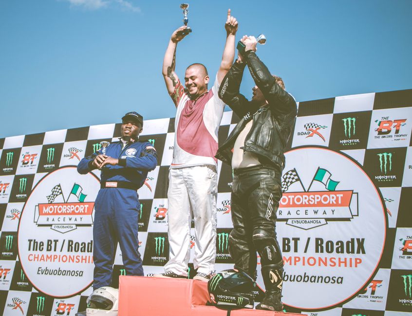 Kimi Antonelli holding trophy Spanish Grand Prix podium