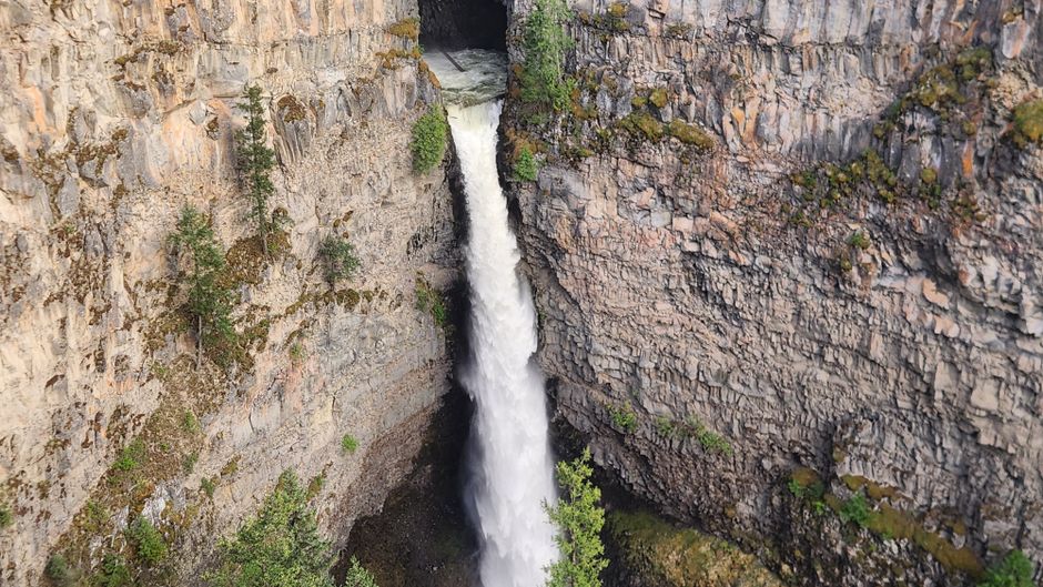 Grunas Waterfall Albania steep drop forest view