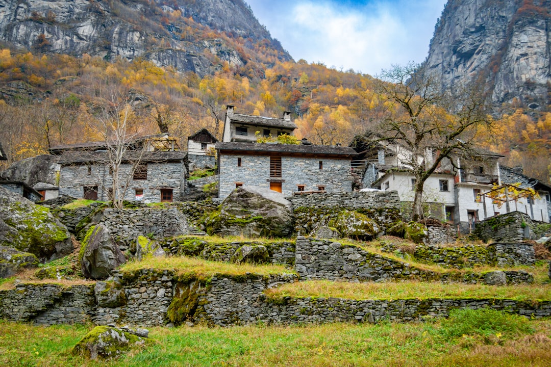 Valbona Valley village traditional stone houses mountains background