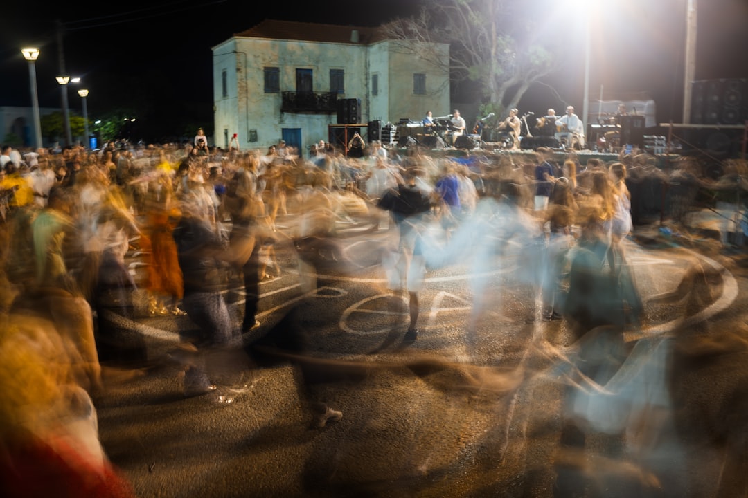 Club Marina Mali Losinj harbor night lights people dancing