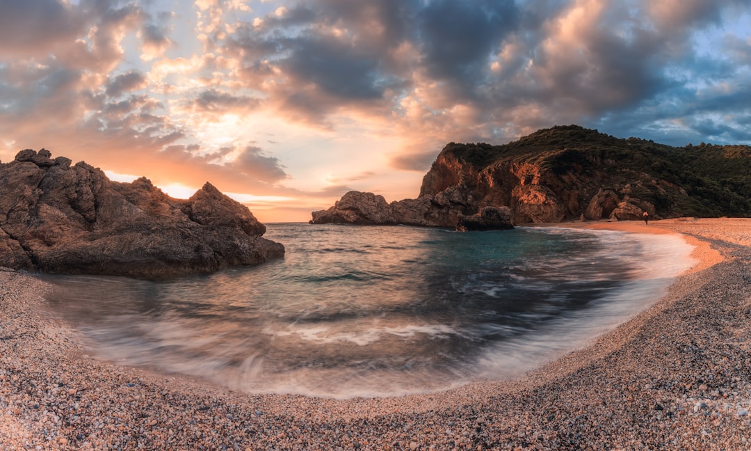 Nea Anchialos thermal beach steam rising from sand Aegean Sea Greece