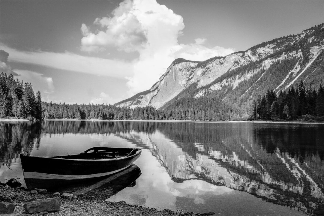 Crno Jezero Black Lake Durmitor reflection mountains rowboat