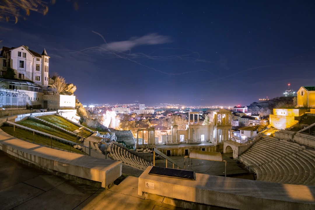 Square of the Arts Plovdiv Bulgaria night people walking
