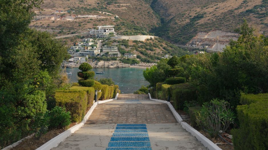 Gjiri i Palas Albania cliffside houses stone steps sea view