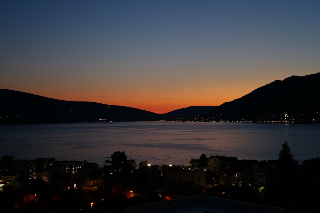 Tivat Montenegro marina nightlife bars evening lights crowd