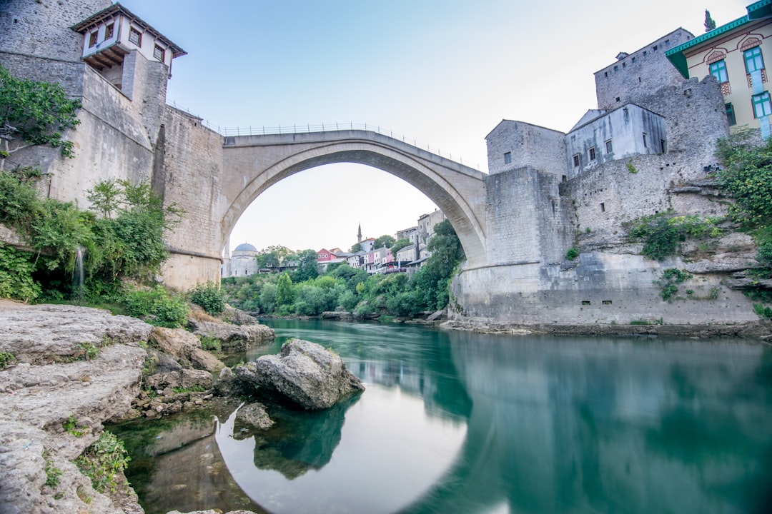 Stari Most bridge Mostar Bosnia Herzegovina night view Neretva River reflection