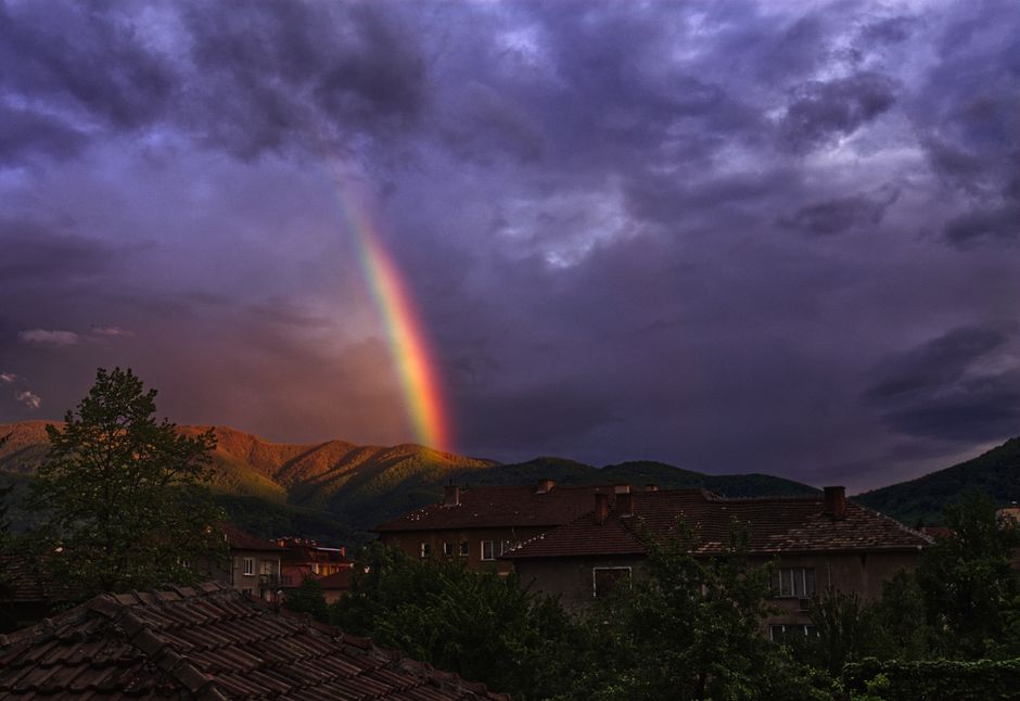 Rila village Bulgaria guesthouse street evening lights