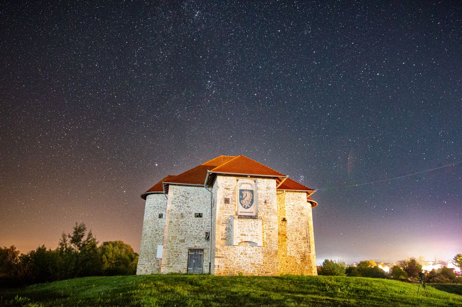 Rila Monastery night sky stars stone walls