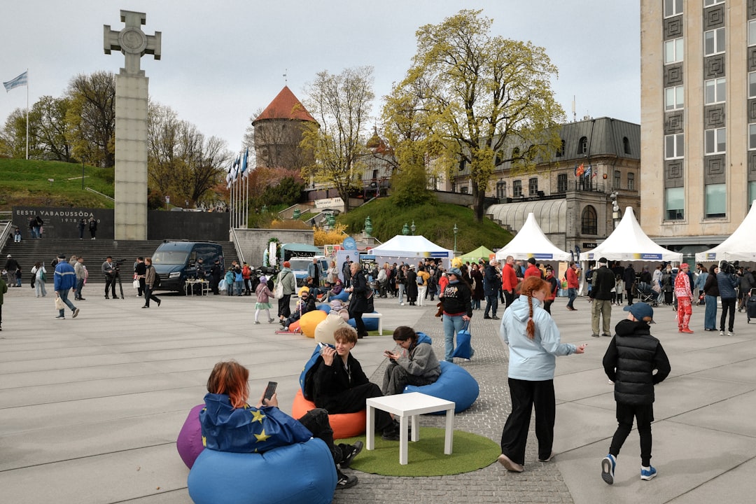Balkan fans watching football match in public square