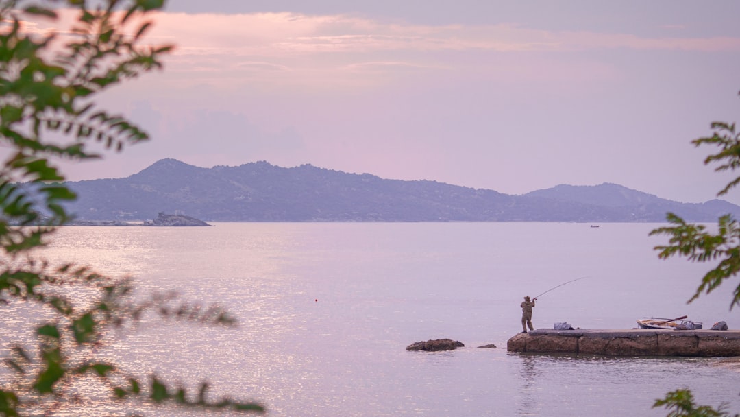 Ouranoupoli Greece beach sunset calm water