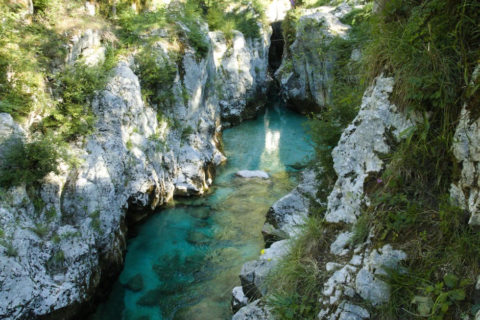 Una River Bosnia turquoise water flowing through limestone gorge