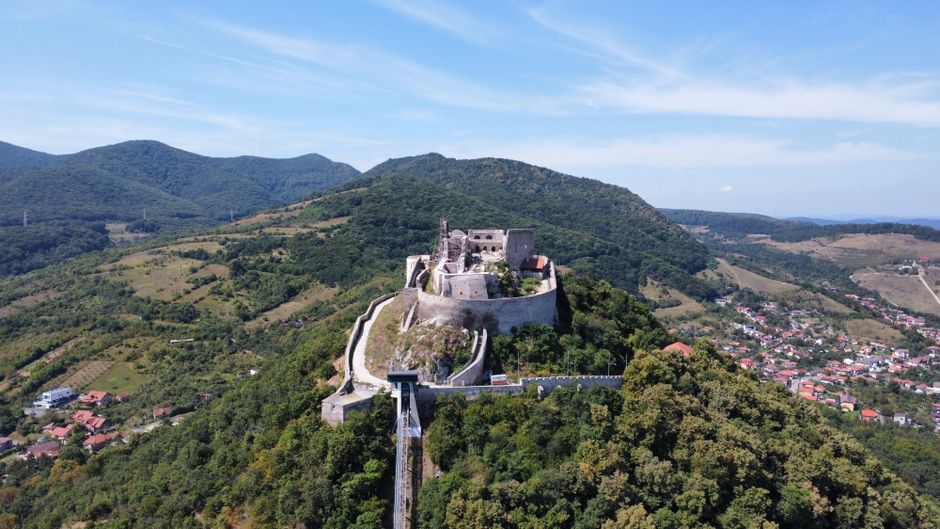 Odobești fortress Romania stone walls towers green hills