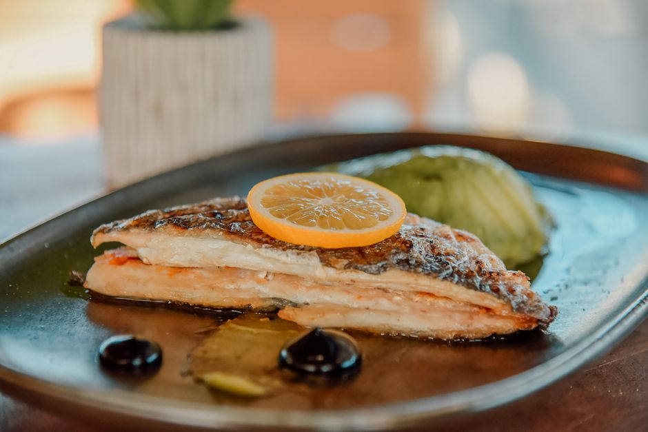 Mamaia Romania grilled fish street food plate lemon