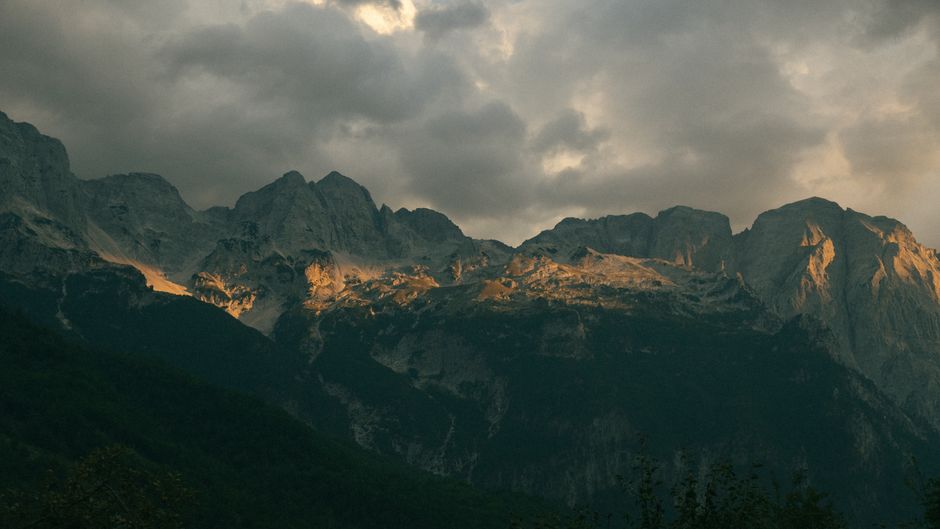 Valbona Valley Albania river stone bridge village green meadow