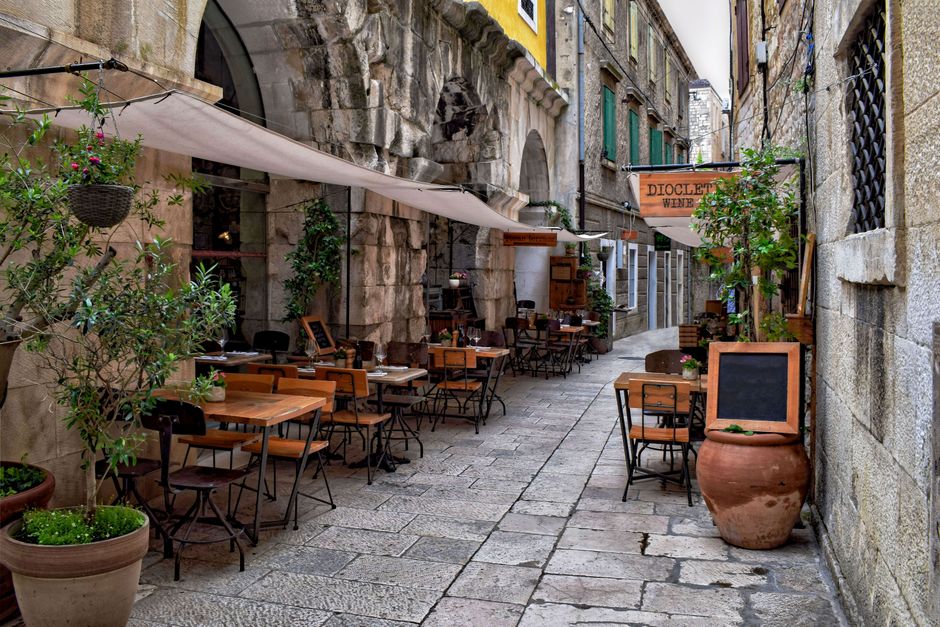 Rab Town Croatia nightlife stone street bars outdoor seating evening