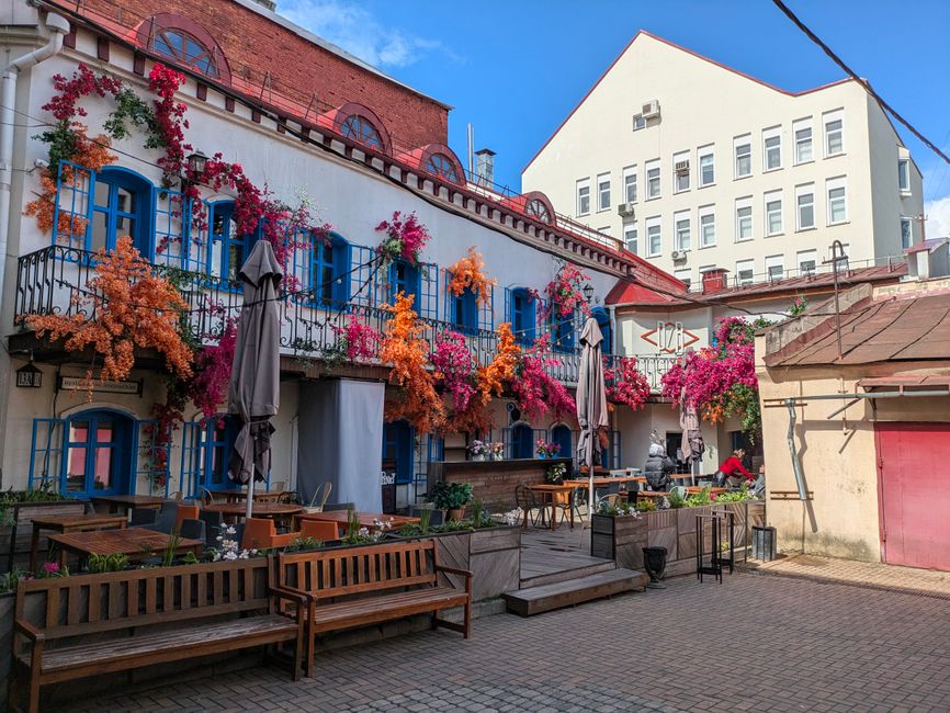 Rila Monastery courtyard restaurant wooden benches banitsa yogurt