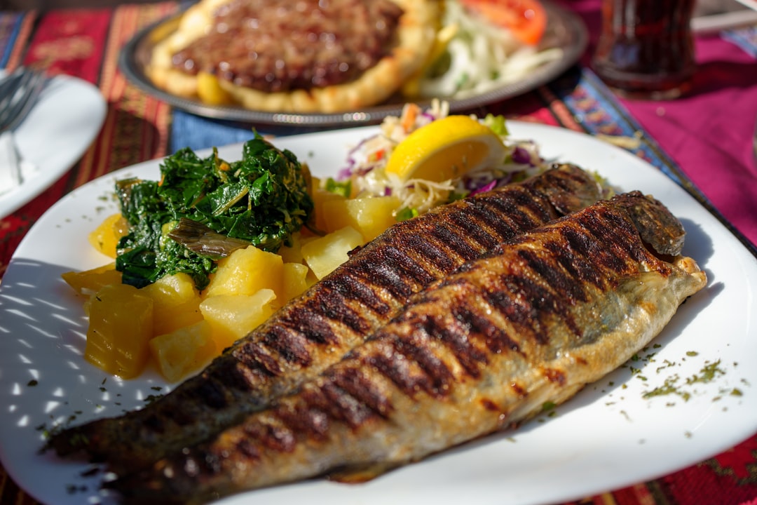 Albanian food spread fresh trout byrek local wine