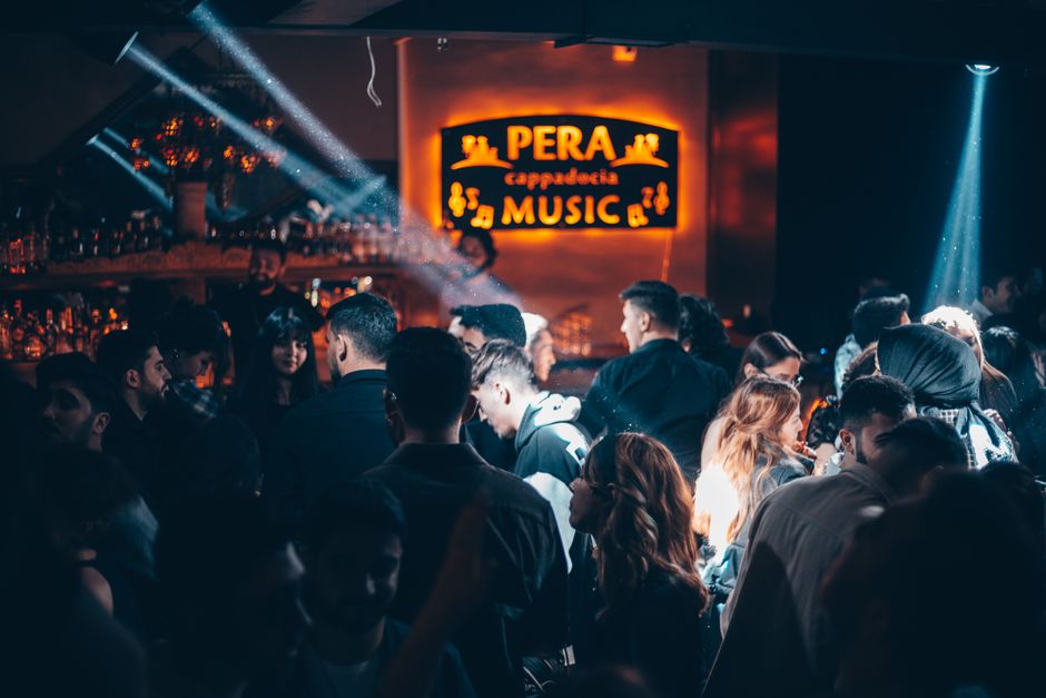 Neum promenade nightlife Bosnia Herzegovina crowded bars lights