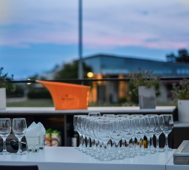 Vineyard bar Vlăhița Romania hilltop view sunset glasses of wine