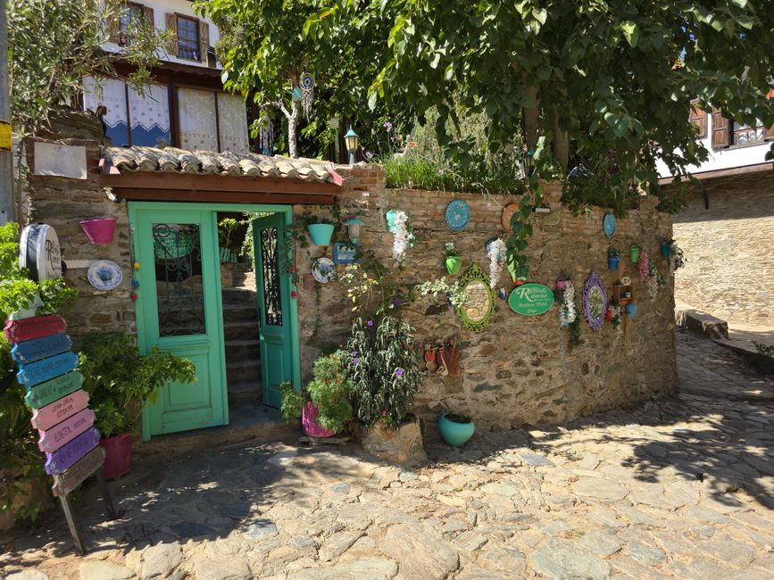 Karaburun village Albania guesthouse exterior courtyard