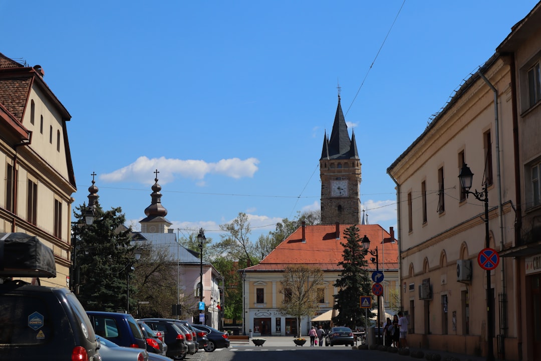 Sighișoara Citadel Romania colorful houses clock tower cobblestone street