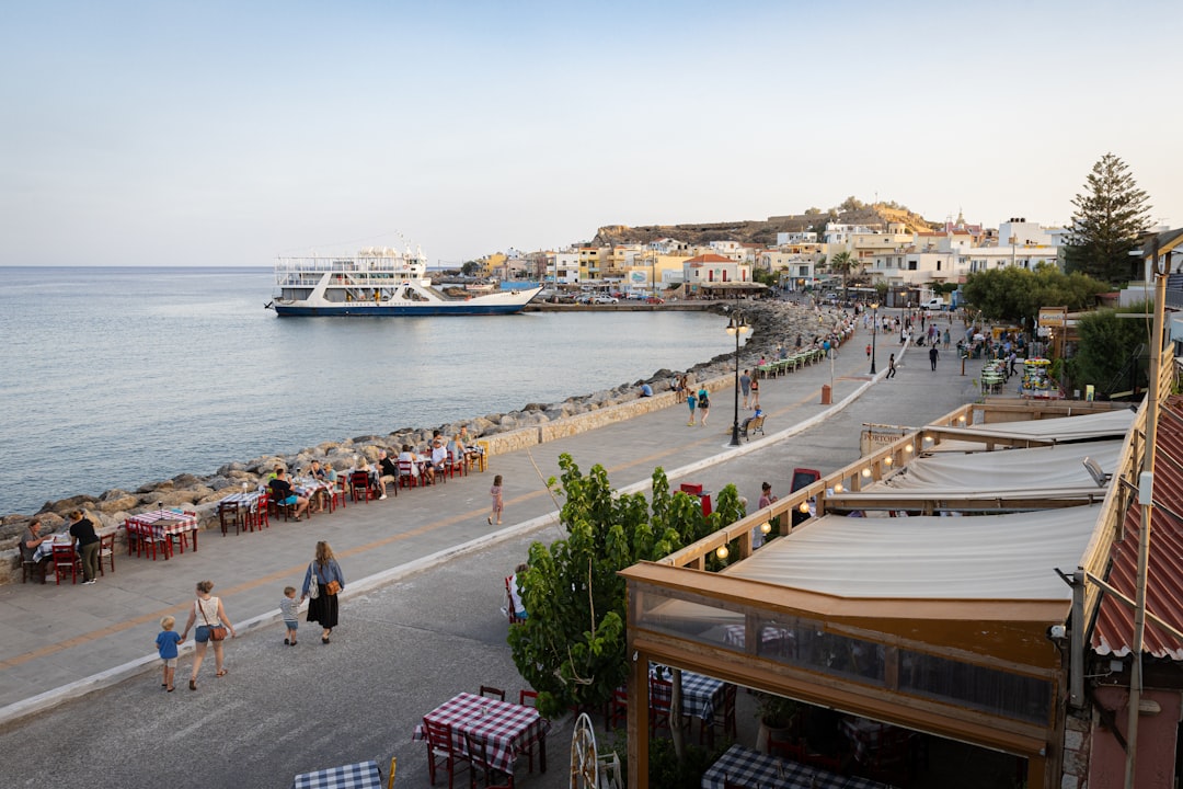 Plakias harbor Crete tavernas outdoor seating evening