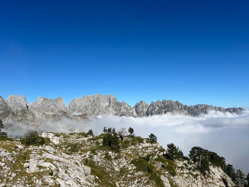 Accursed Mountains Albania panoramic view jagged peaks deep valleys alpine meadows