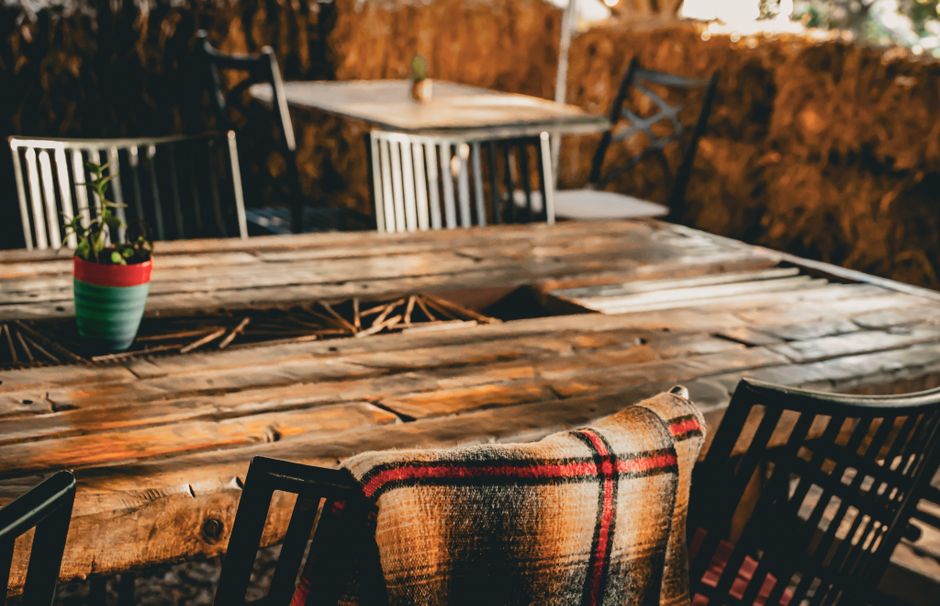 Horezu local restaurant interior wooden tables rustic