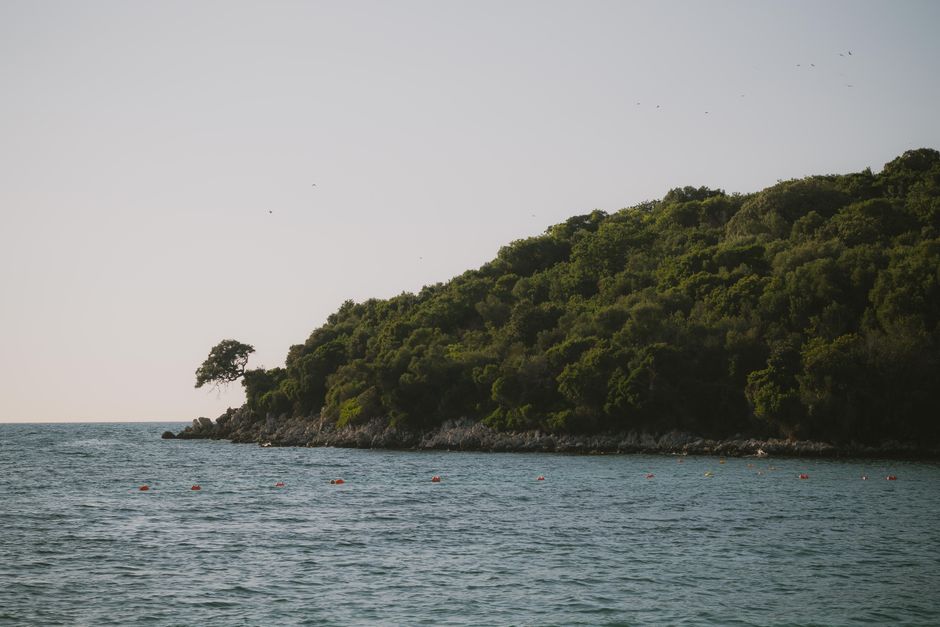 Ksamil Island 2 Albania small beach deep blue water