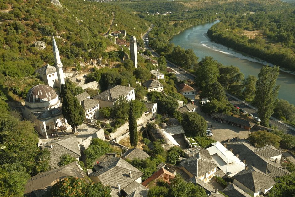 Gacko village Bosnia Herzegovina stone houses church square morning