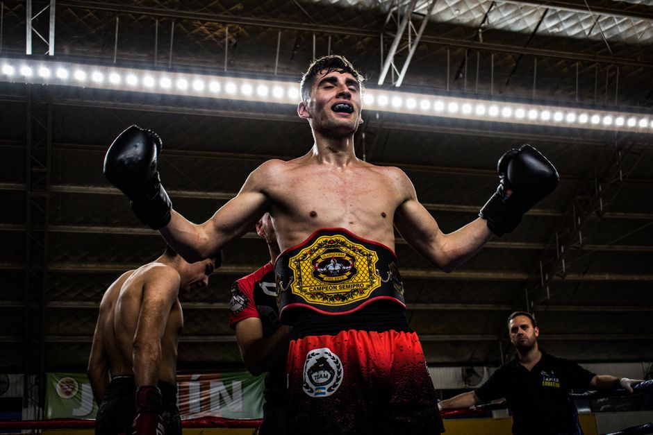 Makhach Topuria celebrates UFC featherweight championship belt