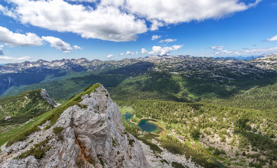 Triglav Peak Slovenia summit view hiker celebration