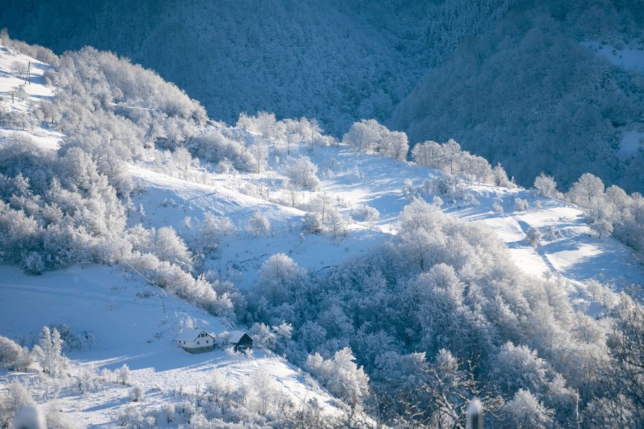 Cabana Retezat Romania mountain refuge exterior snow covered
