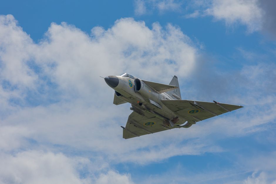 Saab Gripen E fighter jet taking off runway