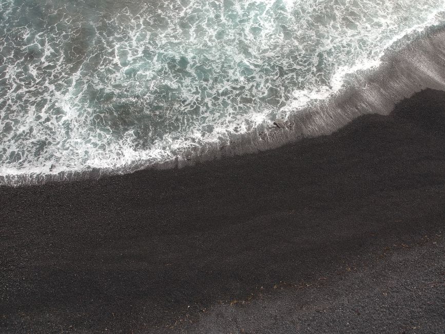 Voutas Beach Chios black sand contrast blue water
