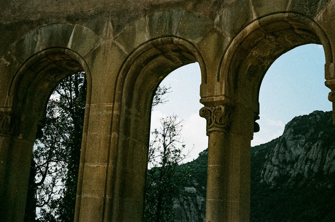 Rila Monastery Cloisters stone arches quiet monks
