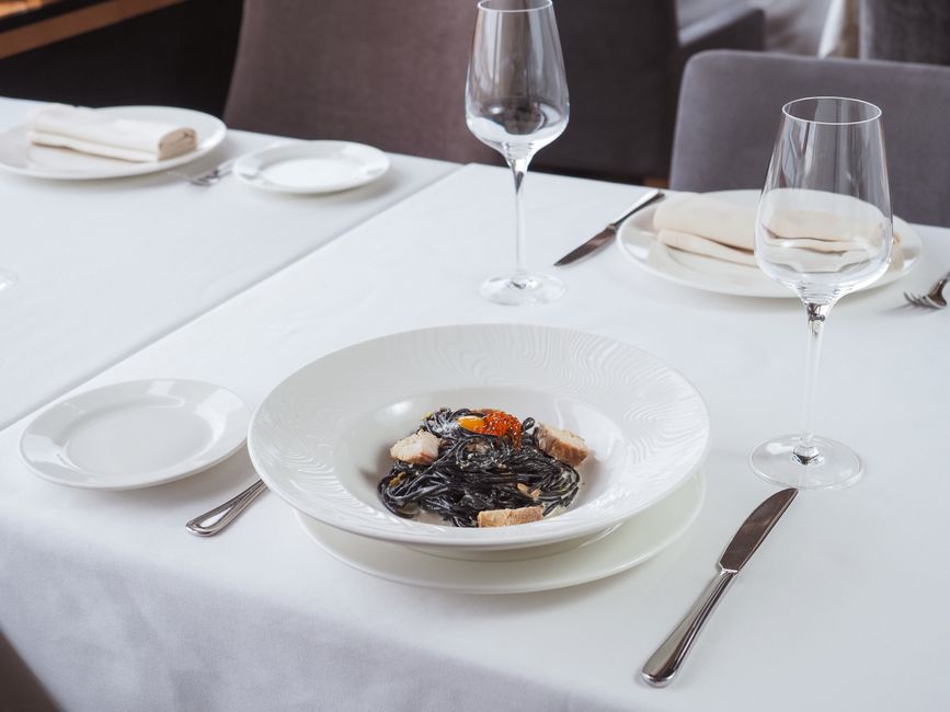 Crni Rižot Croatia black risotto squid ink plate restaurant table