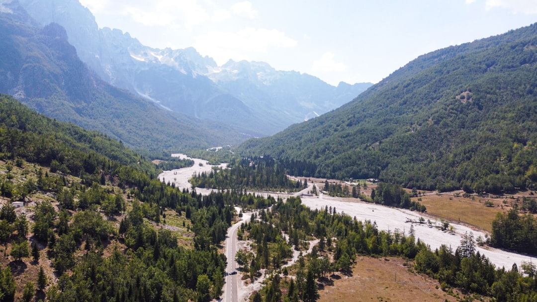 Rragam Pass Albania panoramic view Accursed Mountains clouds