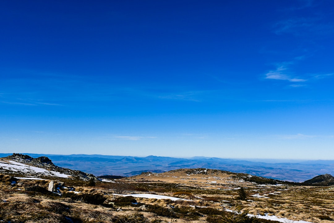 Yulen Peak Bulgaria summit view snow-capped mountains